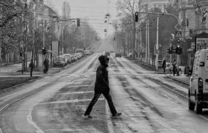 man walking on street